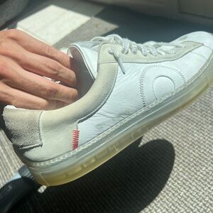 Oliver Cabells. Bought them new scuffed